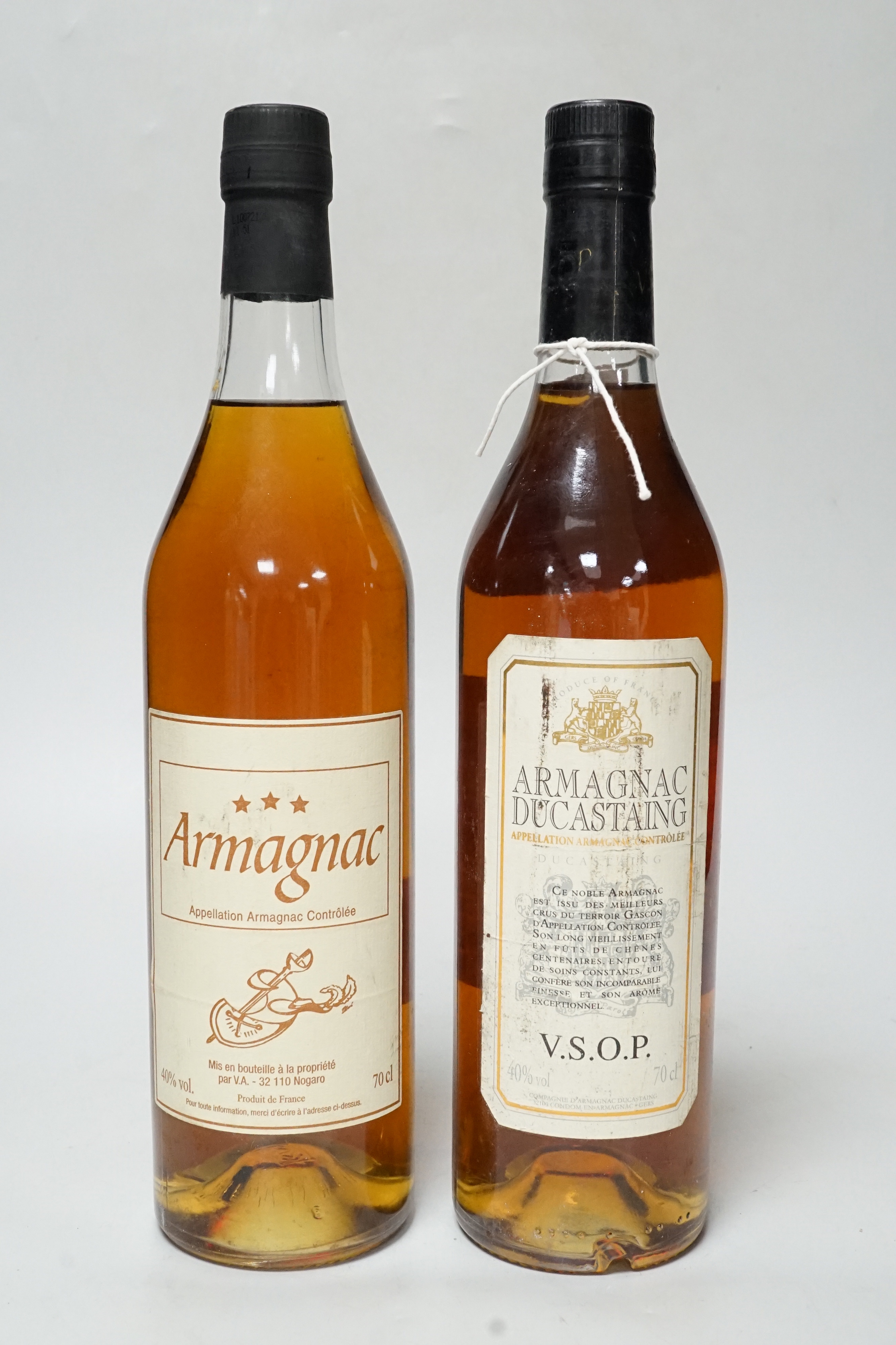 A bottle of Armagnac Ducastaing and another bottle of Armagnac